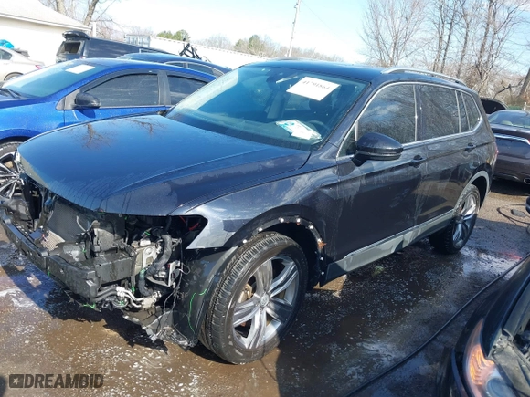 2020 Volkswagen Tiguan SE with VIN 3VV2B7AX5LM116837, listed as a IAAI auction lot 41791864 with 76,623 mi miles. Bid and sale history available at carsss.com. Image 2.