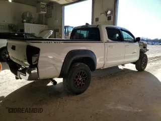2021 Toyota Tacoma 4WD SR5 with VIN 3TMDZ5BN4MM103311, listed as a Copart auction lot 46486445 with 125,685 mi miles and Salvage Title. Bid and sale history available at carsss.com. Image 3.