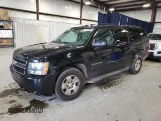 2014 Chevrolet Suburban LT with VIN 1GNSCJE01ER203892, listed as a Copart auction lot 45012795 with 183,901 mi miles and Salvage Title. Bid and sale history available at carsss.com. Image 1.