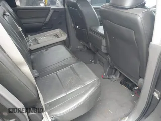 2005 Nissan Titan LE z VIN 1N6AA07B05N557667, wystawiony jako IAAI lot #42292562 z przebiegiem 197 874 mil mil oraz . Historia ofert i sprzedaży dostępna na DreamBid. Obrazek 8.