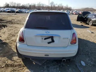 2004 MINI Hardtop with VIN WMWRC334X4TJ54215, listed as a Copart auction lot 46860695 with Not Provided miles and Salvage Title. Bid and sale history available at DreamBid. Image 6.