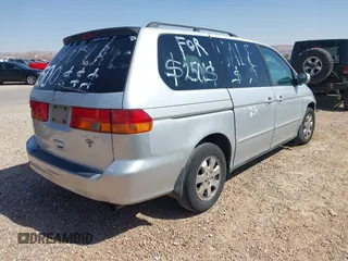 2004 Honda Odyssey EX-L with VIN 5FNRL18904B080009, listed as a IAAI auction lot 41736651 with 461,326 mi miles and . Bid and sale history available at DreamBid. Image 4.