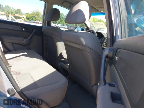 2009 Honda CR-V LX with VIN JHLRE48379C011817, listed as a IAAI auction lot 42059815 with 217,661 mi miles. Bid and sale history available at carsss.com. Image 8.