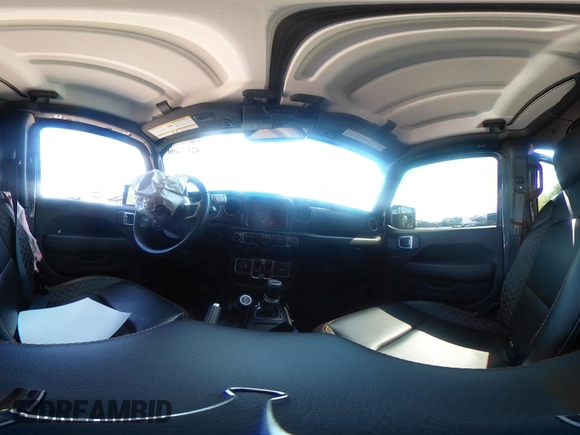 2021 Jeep Gladiator High Altitude z VIN 1C6HJTFG1ML597581, wystawiony jako IAAI lot #42191690 z przebiegiem 47 740 mil mil oraz . Historia ofert i sprzedaży dostępna na DreamBid. Obrazek 18.