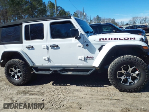 2023 Jeep Wrangler Rubicon with VIN 1C4HJXFG8PW655138, listed as a IAAI auction lot 41674959 with 40,790 mi miles and . Bid and sale history available at DreamBid. Image 13.
