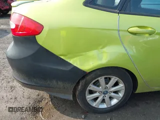2011 Ford Fiesta SE z VIN 3FADP4BJ7BM122774, wystawiony jako IAAI lot #42392327 z przebiegiem 174 764 mil mil oraz . Historia ofert i sprzedaży dostępna na DreamBid. Obrazek 14.