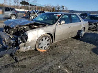 2003 Cadillac DeVille DTS z VIN 1G6KF57963U125853, wystawiony jako Copart lot #42559975 z przebiegiem Nie podano mil oraz Szkody całkowita. Historia ofert i sprzedaży dostępna na DreamBid. Obrazek 1.