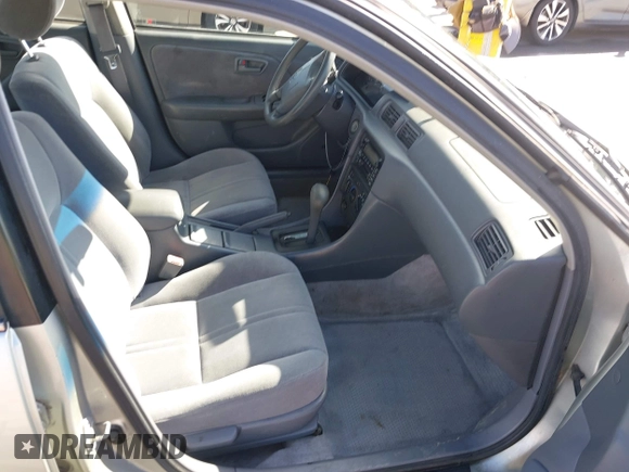2001 Toyota Camry LE z VIN JT2BF22KX10342454, wystawiony jako IAAI lot #41939743 z przebiegiem 124 045 mil mil oraz . Historia ofert i sprzedaży dostępna na DreamBid. Obrazek 5.