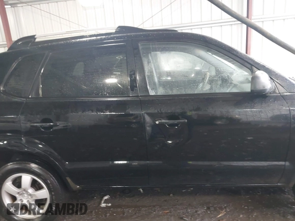 2005 Hyundai Tucson GL with VIN KM8JM12B75U072080, listed as a IAAI auction lot 41779464 with 191,771 mi miles. Bid and sale history available at carsss.com. Image 13.