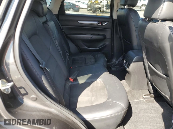2017 Mazda CX-5 Touring with VIN JM3KFACLXH0131443, listed as a Copart auction lot 48524845 with 102,731 mi miles and Salvage Title. Bid and sale history available at carsss.com. Image 12.