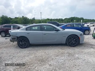 2022 Dodge Charger R/T with VIN 2C3CDXCTXNH240387, listed as a IAAI auction lot 42471923 with 66,616 mi miles and . Bid and sale history available at DreamBid. Image 14.