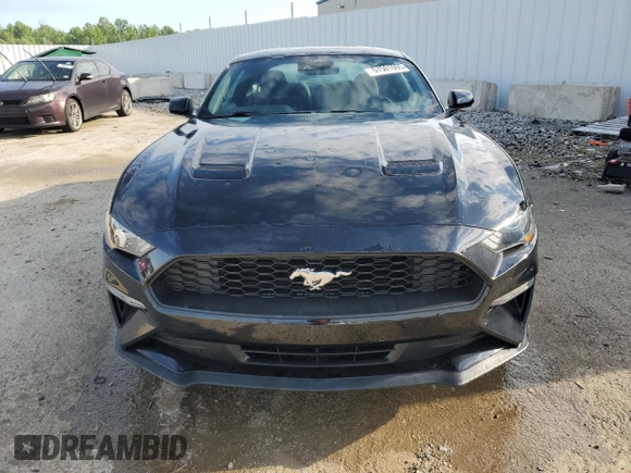 2021 Ford Mustang EcoBoost with VIN 1FA6P8THXM5112258, listed as a Copart auction lot 57501095 with 83,309 mi miles and Salvage title. Bid and sale history available at DreamBid. Image 5.