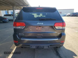 2014 Jeep Grand Cherokee Overland with VIN 1C4RJFCM1EC582749, listed as a Copart auction lot 42262345 with 133,285 mi miles and Clean Title. Bid and sale history available at DreamBid. Image 6.