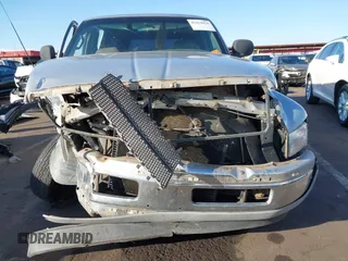 1998 Dodge 1500 z VIN 1B7HC13Y1WJ115002, wystawiony jako IAAI lot #41434924 z przebiegiem Nie podano mil oraz . Historia ofert i sprzedaży dostępna na DreamBid. Obrazek 13.