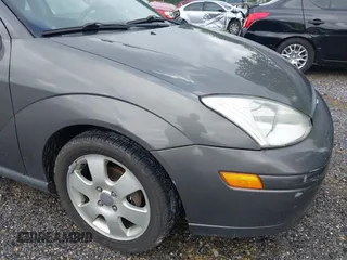2002 Ford Focus ZX3 with VIN 3FAFP31322R232138, listed as a IAAI auction lot 42253174 with 178,405 mi miles and . Bid and sale history available at DreamBid. Image 17.