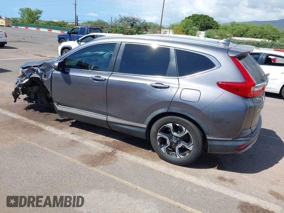 2018 Honda CR-V Touring with VIN 7FARW1H90JE030766, listed as a IAAI auction lot 41637900 with Not Provided miles and . Bid and sale history available at DreamBid. Image 3.