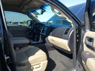 2014 Toyota Sequoia Limited with VIN 5TDKY5G13ES055656, listed as a IAAI auction lot 41616322 with 118,859 mi miles. Bid and sale history available at carsss.com. Image 5.
