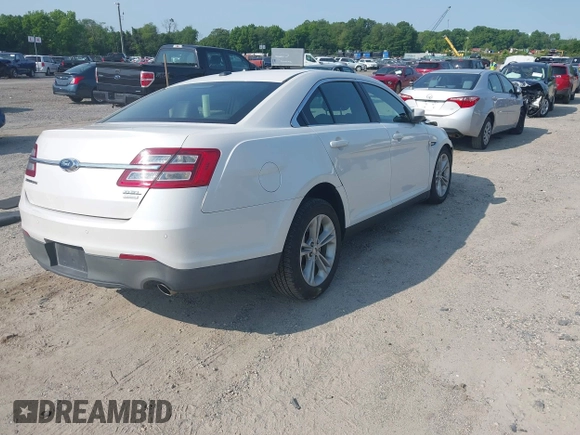 2015 Ford Taurus SEL with VIN 1FAHP2E97FG149657, listed as a IAAI auction lot 42400856 with 138,386 mi miles and . Bid and sale history available at DreamBid. Image 4.
