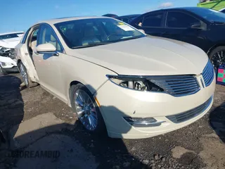 2016 Lincoln MKZ z VIN 3LN6L2G9XGR605070, wystawiony jako IAAI lot #41705442 z przebiegiem 136 565 mil mil oraz . Historia ofert i sprzedaży dostępna na DreamBid. Obrazek 1.