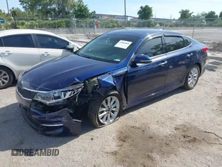 2018 Kia Optima EX with VIN 5XXGU4L32JG261985, listed as a IAAI auction lot 42083868 with 33,264 mi miles and . Bid and sale history available at carsss.com. Image 2.