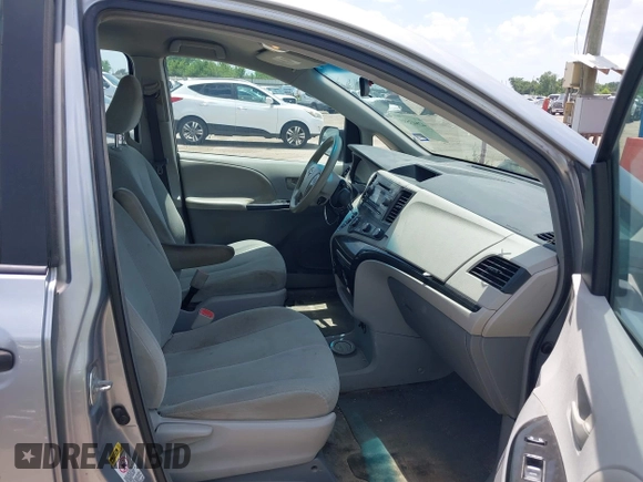 2013 Toyota Sienna L with VIN 5TDZK3DCXDS403672, listed as a IAAI auction lot 42843593 with 178,046 mi miles and . Bid and sale history available at DreamBid. Image 5.