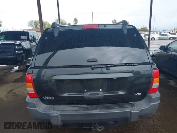 2004 Jeep Grand Cherokee Laredo z VIN 1J4GX48N94C435700, wystawiony jako IAAI lot #41809624 z przebiegiem 147 413 mil mil oraz . Historia ofert i sprzedaży dostępna na DreamBid. Obrazek 16.