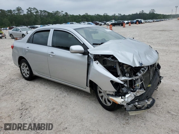 2013 Toyota Corolla L with VIN JTDBU4EE7DJ116188, listed as a Copart auction lot 51172415 with 127,065 mi miles and Salvage Title. Bid and sale history available at DreamBid. Image 4.
