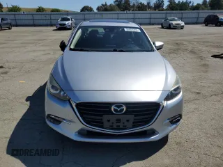 2017 Mazda 3 Grand Touring z VIN 3MZBN1W37HM141705, wystawiony jako Copart lot #56604255 z przebiegiem 62 308 mil mil oraz Szkoda całkowita • Salvage title. Historia ofert i sprzedaży dostępna na DreamBid. Obrazek 5.