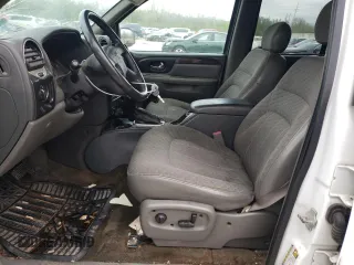 2004 GMC Envoy SLE z VIN 1GKET12S046180203, wystawiony jako Copart lot #49192664 z przebiegiem 132 260 mil mil oraz Szkody całkowita. Historia ofert i sprzedaży dostępna na DreamBid. Obrazek 7.