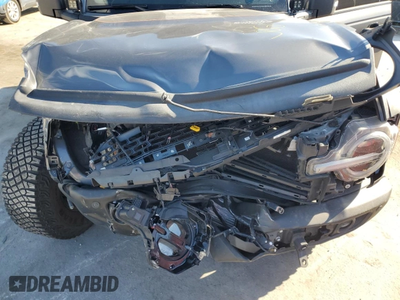 2022 Ford Bronco with VIN 1FMEE5DH1NLB82717, listed as a Copart auction lot 83230614 with 21,593 mi miles and Salvage Title. Bid and sale history available at DreamBid. Image 13.