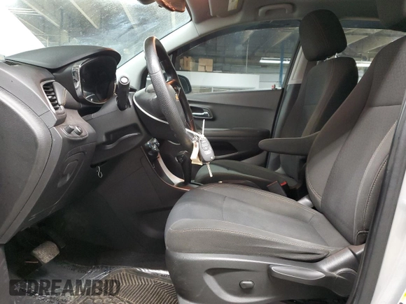 2020 Chevrolet Trax LS with VIN KL7CJKSB7LB327991, listed as a Copart auction lot 49324845 with 54,011 mi miles and Salvage Title. Bid and sale history available at DreamBid. Image 7.