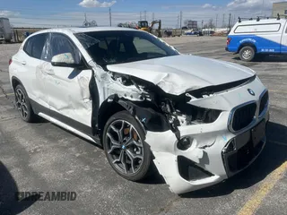 2018 BMW X2 xDrive28i with VIN WBXYJ5C38JEF78537, listed as a Copart auction lot 49721715 with 20,589 mi miles and Salvage Title. Bid and sale history available at carsss.com. Image 1.
