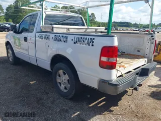 2005 Ford F-150 XL with VIN 1FTRF12W95NB42063, listed as a IAAI auction lot 41874938 with 254,029 mi miles. Bid and sale history available at carsss.com. Image 3.