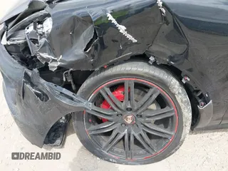 2014 Porsche Cayenne GTS with VIN WP1AD2A25ELA71350, listed as a IAAI auction lot 42031766 with 104,184 mi miles and . Bid and sale history available at DreamBid. Image 6.