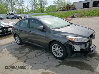 2018 Ford Focus SE z VIN 1FADP3F24JL204488, wystawiony jako Copart lot #54733625 z przebiegiem Nie podano mil oraz Szkoda całkowita • Salvage title. Historia ofert i sprzedaży dostępna na DreamBid. Obrazek 13.