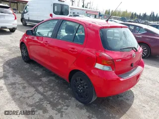 2010 Toyota Yaris with VIN JTDKT4K34A5298426, listed as a IAAI auction lot 42008402 with 105,580 mi miles. Bid and sale history available at carsss.com. Image 3.