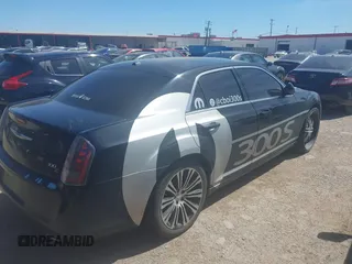 2013 Chrysler 300 with VIN 2C3CCABG1DH709935, listed as a IAAI auction lot 41814279 with 101,174 mi miles. Bid and sale history available at carsss.com. Image 4.