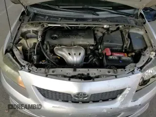 2010 Toyota Corolla z VIN 1NXBE4EE2AZ286302, wystawiony jako Copart lot #83907794 z przebiegiem 171 915 mil mil oraz Szkoda całkowita • Salvage title. Historia ofert i sprzedaży dostępna na DreamBid. Obrazek 13.