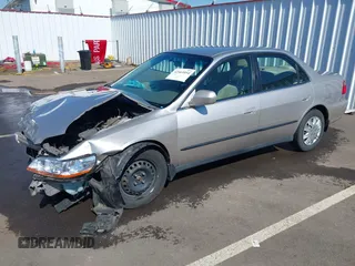 1999 Honda Accord LX with VIN JHMCG5545XC028563, listed as a IAAI auction lot 42461054 with 212,100 mi miles and . Bid and sale history available at DreamBid. Image 18.