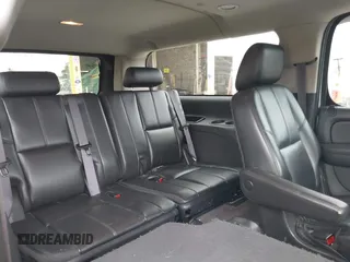 2011 Chevrolet Suburban LT with VIN 1GNSKJE32BR330742, listed as a IAAI auction lot 42435335 with 191,663 mi miles and . Bid and sale history available at DreamBid. Image 8.