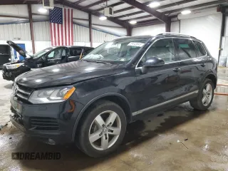 2011 Volkswagen Touareg Lux с VIN WVGFK9BP6BD001888, выставлен на аукционе Copart как лот 59443845 с пробегом 114 541 миль миль и Списание • Salvage title. История ставок и продаж доступна на DreamBid. Изображение 1.