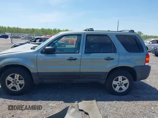 2005 Ford Escape Hybrid z VIN 1FMCU96HX5KC07151, wystawiony jako IAAI lot #42093744 z przebiegiem 275 661 mil mil oraz . Historia ofert i sprzedaży dostępna na DreamBid. Obrazek 15.