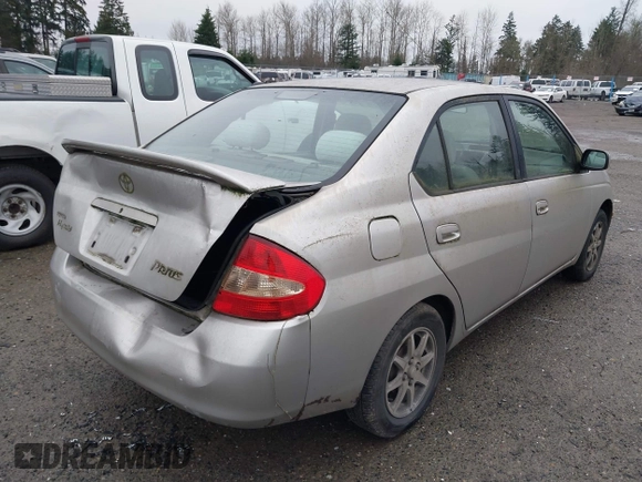 2003 Toyota Prius with VIN JT2BK18U030072183, listed as a IAAI auction lot 41260964 with 291,451 mi miles. Bid and sale history available at carsss.com. Image 4.