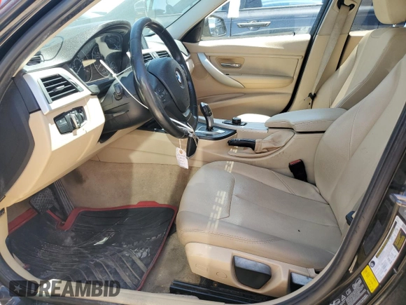 2015 BMW 3 Series 320i xDrive with VIN WBA3C3G57FNS74781, listed as a Copart auction lot 52324455 with 131,924 mi miles and Salvage title. Bid and sale history available at DreamBid. Image 7.