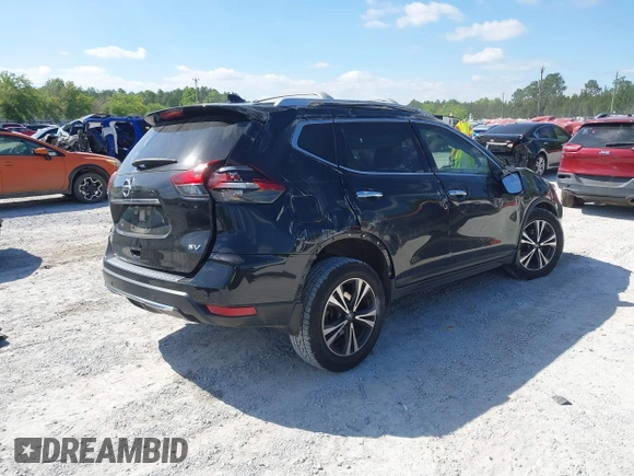 2019 Nissan Rogue SV with VIN JN8AT2MT4KW250082, listed as a IAAI auction lot 42026957 with 81,724 mi miles and . Bid and sale history available at DreamBid. Image 4.