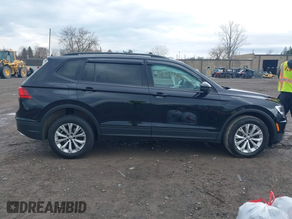 2019 Volkswagen Tiguan S with VIN 3VV0B7AX0KM046024, listed as a IAAI auction lot 41924867 with 126,729 mi miles and . Bid and sale history available at DreamBid. Image 14.