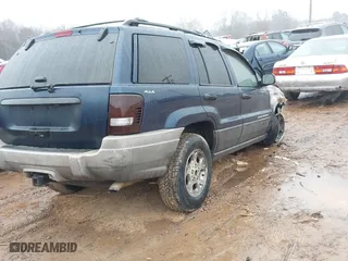 1999 Jeep Grand Cherokee Laredo with VIN 1J4GW58N3XC760274, listed as a IAAI auction lot 41541029 with 1 mi miles. Bid and sale history available at carsss.com. Image 4.
