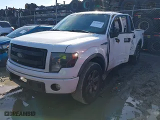 2013 Ford F-150 XL with VIN 1FTFW1ET4DKF24134, listed as a IAAI auction lot 41411293 with 289,430 mi miles. Bid and sale history available at carsss.com. Image 17.