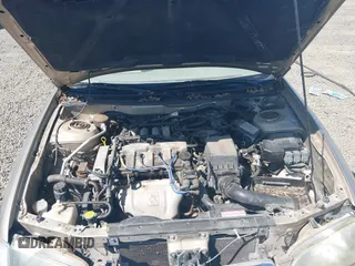 1999 Mazda 626 ES z VIN 1YVGF22C5X5811946, wystawiony jako IAAI lot #41970165 z przebiegiem 126 709 mil mil oraz . Historia ofert i sprzedaży dostępna na DreamBid. Obrazek 10.