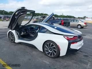 2015 BMW i8 with VIN WBY2Z2C51FV392661, listed as a IAAI auction lot 38409147 with 79,082 mi miles. Bid and sale history available at carsss.com. Image 3.